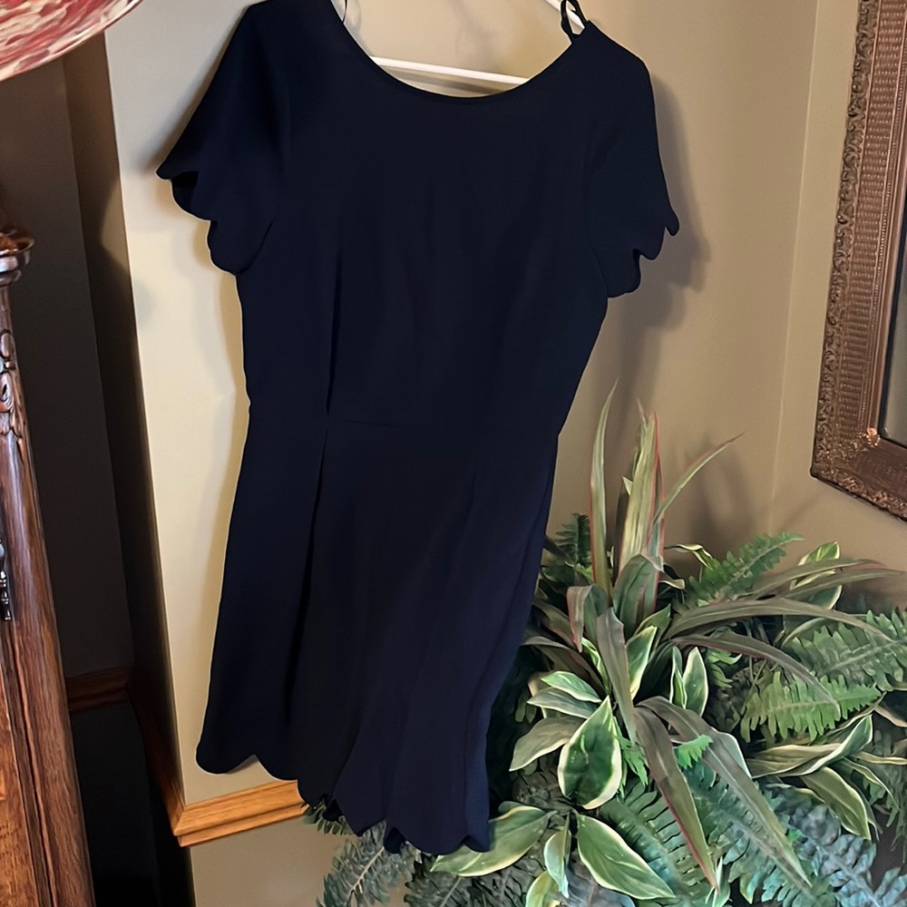 Navy romper with scalloped sleeve, NWT